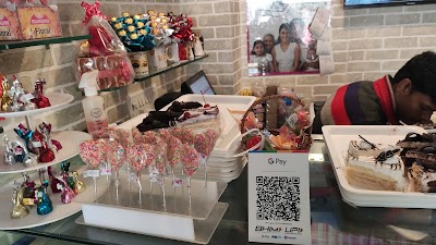 BAKECTTMV32F_Monginis_Cake_Shop_ChIJaTKrxNwr8jkRtMEB01lmcmA_8