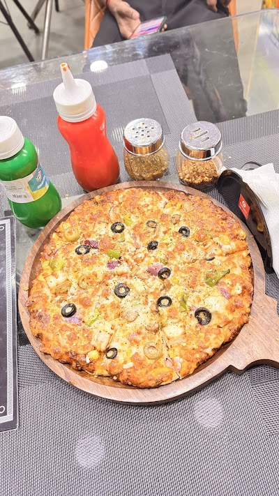 BAKEP6LKCOK7_The_Family_table_ChIJvVV992ND8jkRSLXFbNKdTZc_8