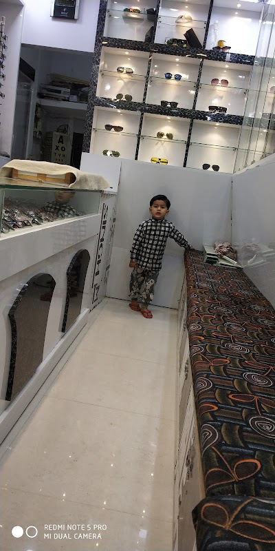 MANFM3PS7XOC_Raj_Dental___Optical_ChIJ1Qv84ywj8jkRT0cE3uOlby0_4